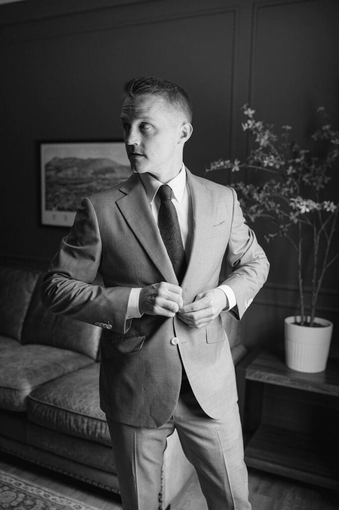 Groom getting ready in Bloom Meadow's guest suite