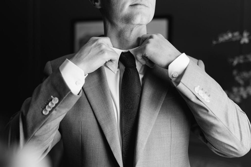 Groom getting ready in Bloom Meadow's guest suite