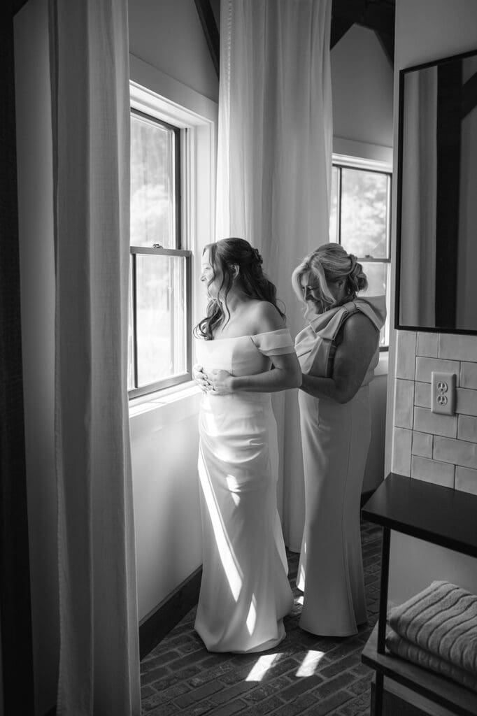 Bride getting ready in the Silo Suite at Bloom Meadows