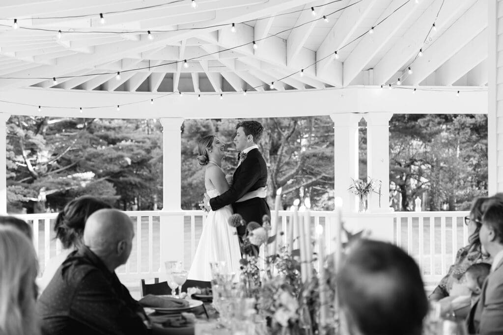 bride and groom share their first dance